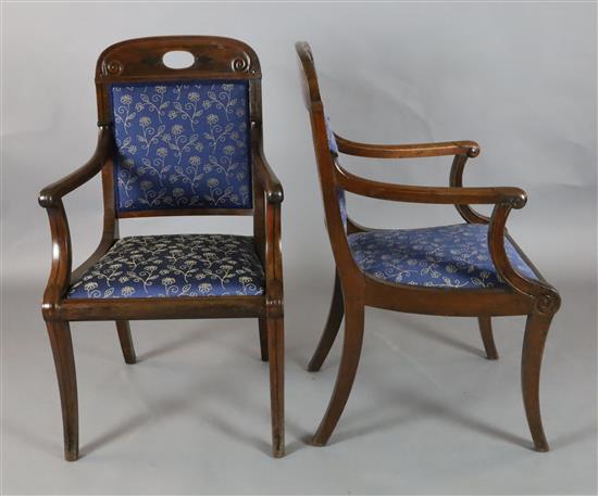 A pair of 19th century French Empire style ebony strung mahogany elbow chairs, W.1ft 10in. H.3ft 1in.